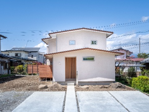 外壁：スーパー白州そとん壁W　W-122 オリジナル仕上げ（木こて仕上げ）